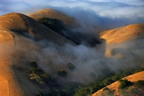 Fingers of fog flowing over the Diablo Foothills 