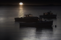 Fishing boats before dawn in Maine   Original content