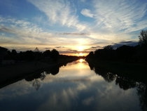 Florence Italy Sunset reflecting on the river arno from the passerella delle cascine bridge 