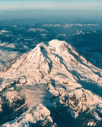Flying over Mount Rainier at sunset  IG solushmusic