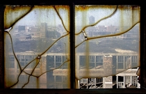 For dirty cracked window you can see the abandoned building of Packard Motors plant