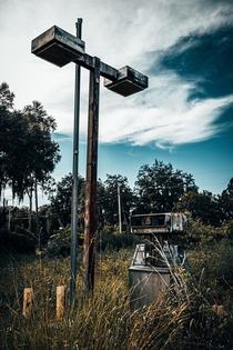 Found this lovely abandoned gas pump and streetlight in the middle of nowhere in Central Florida 