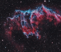 Frightening forms and scary faces are a mark of the Halloween season They also haunt this cosmic close-up of the eastern Veil Nebula The Veil Nebula itself is a large supernova remnant the expanding debris cloud from the death explosion of a massive star 