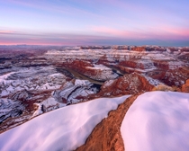 From one of those rare times the canyons near Moab Utah get covered in snow showing off the contrast between red amp white Dead Horse Point during a brisk February sunrise  morgantuohy