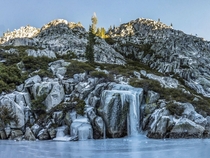 Frozen Waterfall at the shore of Big Bear Lake in the Trinity Alps Wilderness 