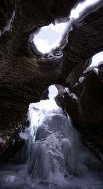Frozen waterfall inside a cave at Natural Bridge in Field BC Canada 