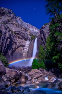 Full Moon - a moonbow lunar rainbow cast by moonlight reflected in the Yosemite Falls CA  photo by Jonathan McLaurin