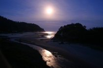 Full moon at  am where fresh water meets the Pacific in Neskowin Oregon 