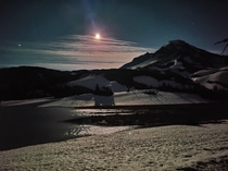 Full moon over Middle Sister Mt and Camp Lake Oregon 