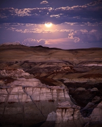 Full moon rising over the Bisti Badlands of New Mexico 