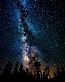 Galactic Center of our Milky Way over a fire watch tower in Central Oregon    mm f lens sec iso -  images edited in Adobe Lightroom and stacked in Photoshop