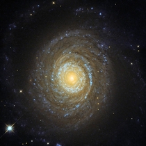 Galaxy NGC  imaged here by the NASAESA Hubble Space Telescope