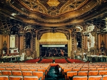 Gilded theater lies in a decaying state