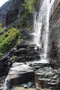 Glacier National Park Montana Trail meets waterfall 