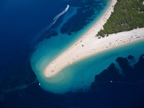 Golden cape a narrow white pebble beach in Croatia The shape of the beach shifts with the changes in tide currents and wind