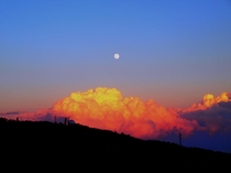Golden clouds and full moon sunset at Crimean Peninsula Photo taken by Sugar Bee