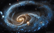 Gorgeous shot of Galaxy UGC  displaying fierce celestial interaction with its smaller galactic neighbour
