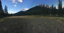 Green and fairway on an abandoned golf course Canmore Alberta
