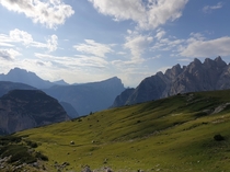 Green landscape with Dolomites in the background 