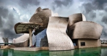 Guggenheim museum in Bilbao city of Spain is a groundbreaking modern architectural marvel The museum was officially opened in October  It was designed by famous American-Canadian architect Frank Gehry The museum features a series of interconnected buildin