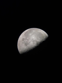 Half Moon taken with a telescope and my phone