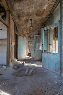Hallway in an old sanatorium with all natural decay