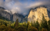 Hanging clouds and autumn light on El Capitan Yosemite Valley 
