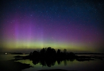 Hat trick Northern lights Milky Way and the Andromeda galaxy over the Swedish skerries 