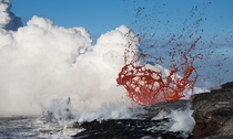 Hawaii USA This is a lava bubble that rarely happens at the ocean entry I have seen this  times writes photographer Tom Kualii These lava bubbles are huge and violent ranging from ft to well over a football field Sounds like  pound bombs 