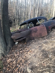 Heres an abandoned car wreck I found in Tennessee 