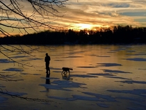 Hike on frozen Upper Nashotah Lake  Wisconsin on a cold January day