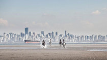 Horses racing on the beach in front of Vancouver British Columbia 