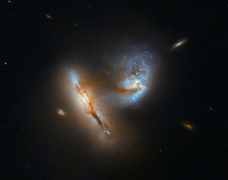 Hubble captures dance of two merging galaxies
