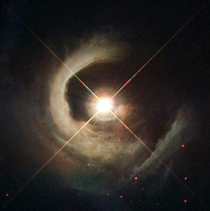 Hubble just released this awesome new image of a star  light years away called V Cyg which resides within a dark nebula 