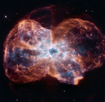Hubble Views the Demise of NGC  a Sun-like Star 