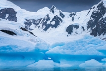 Huge ice pieces and rugged peaks in Antarctica x