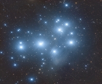 Hundreds of Galaxies in the Pleiades 