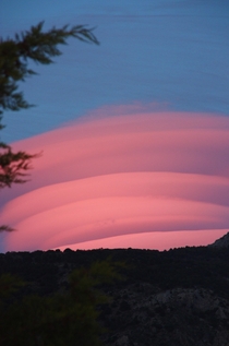 I had  seconds to find my camera and capture this lenticular cloud at sunset in the Sierra Nevada Spain 