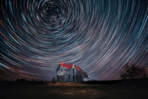 I shot a star trail focused on Polaris over an abandoned house