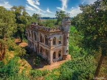 I took a photo with my drone of an abandoned farmhouse that looks like a castle Italy 
