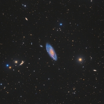 I used two different scopes and over  hours of exposure to reveal hundreds of galaxies in a small region of the sky 
