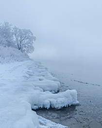 Ice frost and fog along the edge of a lake in south Saskatchewan 