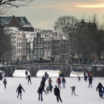 Ice skating highway Keizersgracht canal Amsterdam 