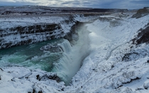 Icelandic Gullfoss waterfall in winter  by Pierre-Selim Huard