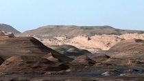 Image of Mars landscape without NASAs orange filter used in their cameras