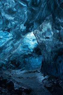 In the depths of an ice cave Iceland   x 