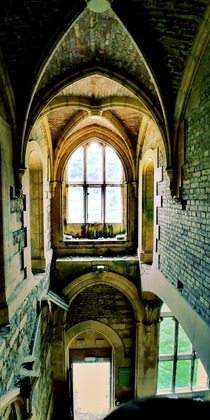 Inside an abandoned Victorian gothic style mansion deep in the English countryside 