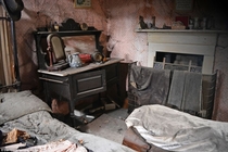 Inside the haunted cottage with a tragic past which has been left to rot with more than  years of valuablesclothes pictures clocks all left untouched Photos by Dan Circa 
