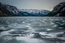 Interesting snow marbling on Lake Minnewanka Alberta Canada 
