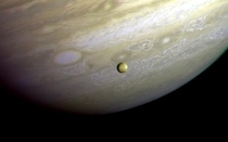 Jupiter and Its moon Io taken by Voyager  in   NASAJPL 